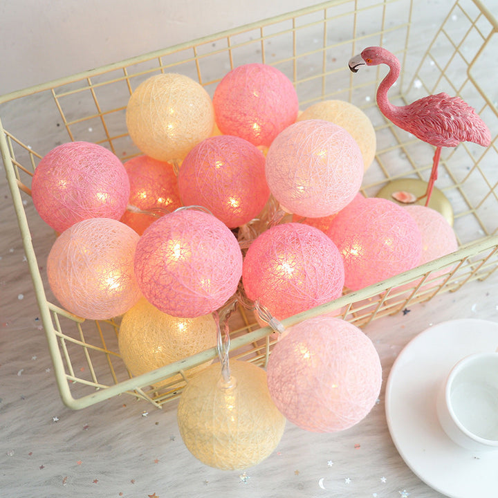 VibeCore Cotton Bubble String Lights in Pink add a warm, playful touch to any room. Battery-powered for easy placement, these lights are perfect for creating a cozy and whimsical vibe in your bedroom, dorm, or apartment.