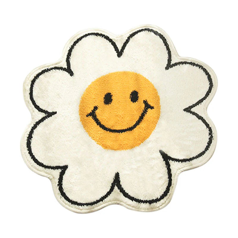 Full product photo of the VibeCore Daisy Flower Accent Rug, featuring its playful smiling flower design, vibrant colors, soft plush texture, and non-slip backing. A cute, cozy rug that adds a cheerful, aesthetic touch to modern bedrooms, dorms, or living rooms.