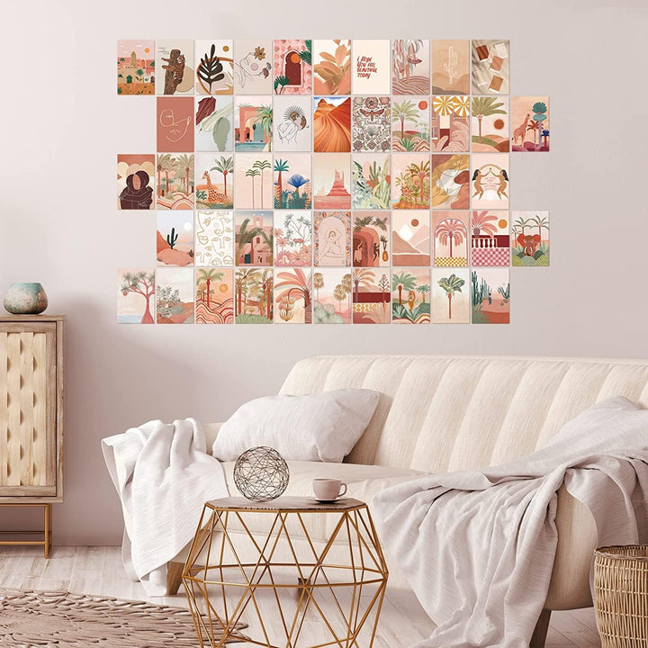 VibeCore Desert Jungle Wall Collage Kit displayed in a living room, featuring 70 unique prints blending desert vibes and jungle-inspired artwork. Perfect for creating an adventurous, eclectic atmosphere in your home.