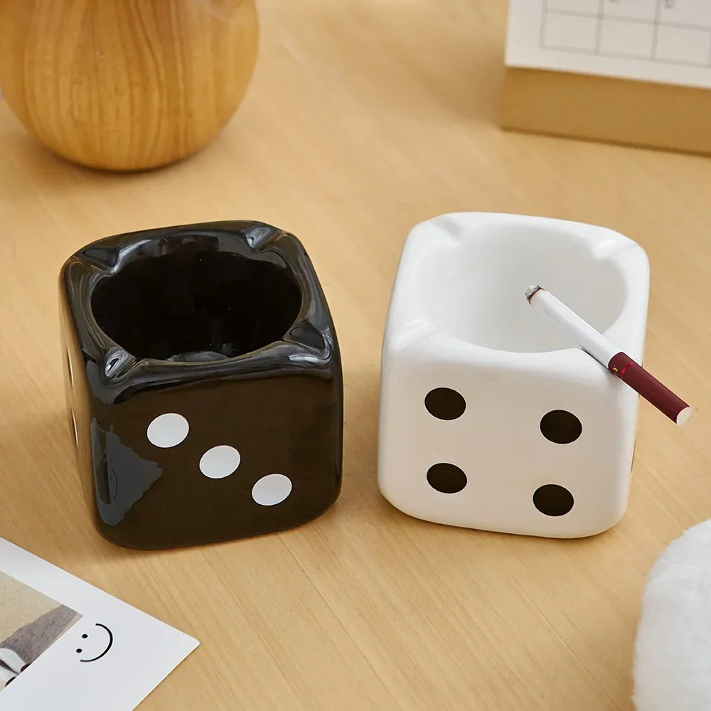 VibeCore Dice Ashtray Black and White With Cigarette In It