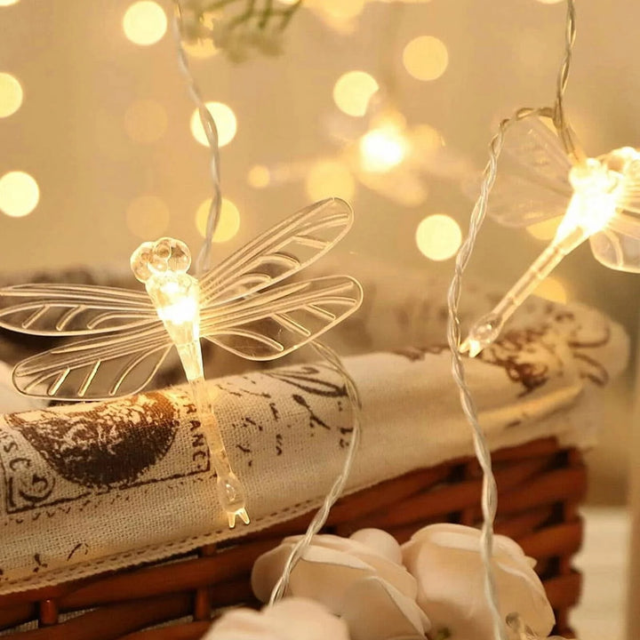 9.8ft LED fairy lights with delicate dragonfly designs, warm white glow, and battery-powered portability. Perfect for adding a magical, whimsical touch to bedrooms, dorms, or apartments.