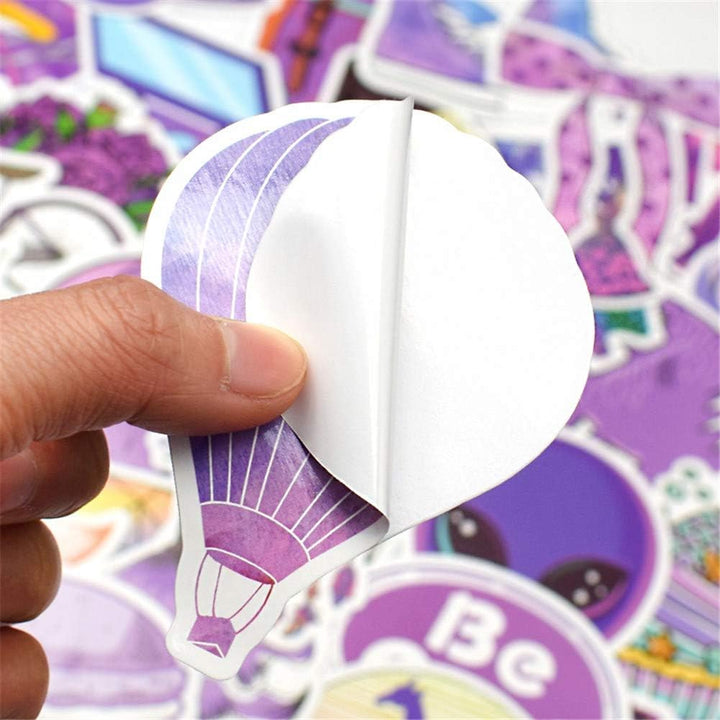VibeCore Edgy Purple Stickers close-up showing the adhesive backing, designed for easy application and removal, featuring vibrant purple aesthetic designs.