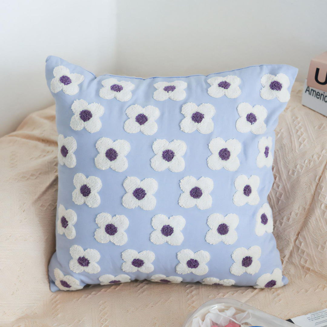 Lavender square throw pillow covers with hand-stitched embroidered daisies, featuring a fresh and floral design. Made from soft, breathable cotton, these covers add a cozy and elegant touch to any space, with a concealed zipper for a polished and functional finish.
