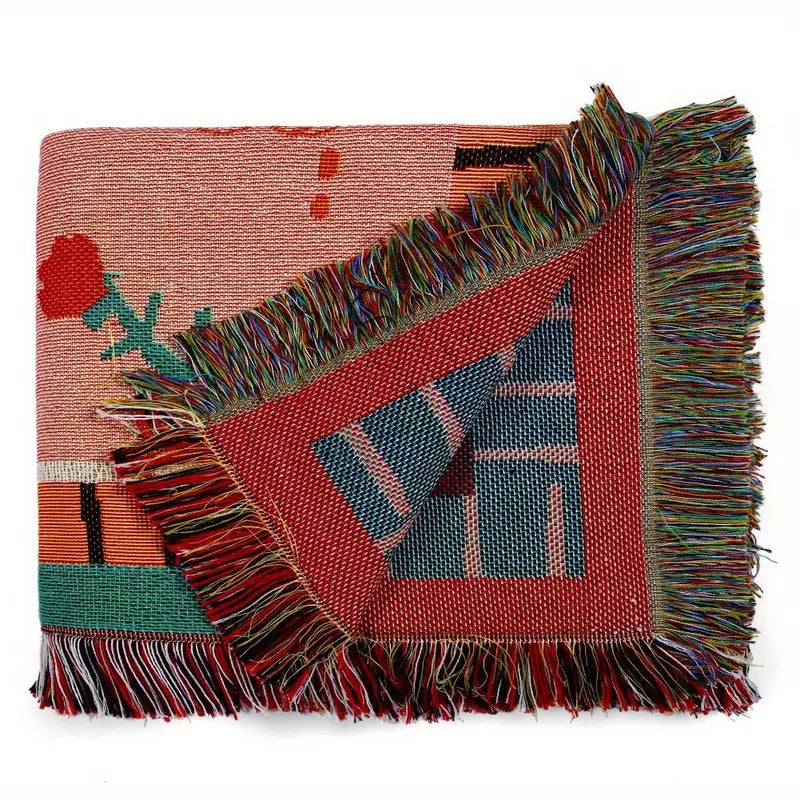 VibeCore Feline Power Woven Blanket folded, showcasing its bold jungle design and soft 100% cotton material, perfect for adding a touch of fierce elegance to your space.