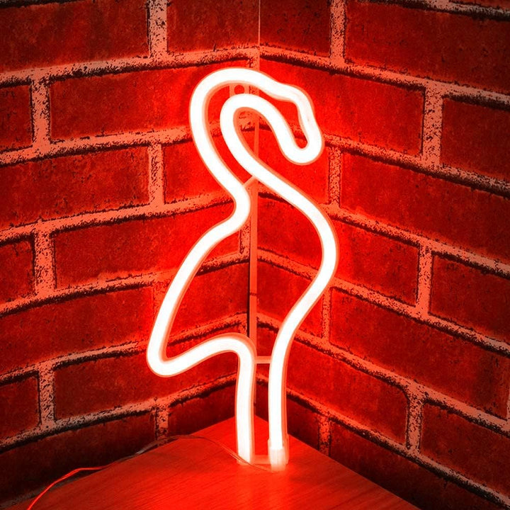 VibeCore Flamingo Neon Light Red Against Brick Wall