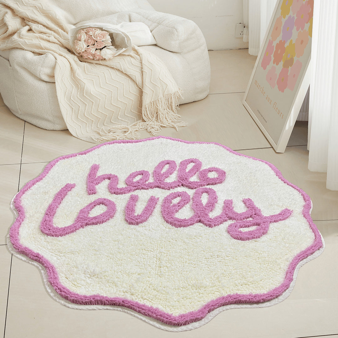 VibeCore "Hello Lovely" Accent Rug showcasing a soft, round design with a sweet, uplifting message, offering a cozy and inviting feel with its plush texture and non-slip backing, perfect for any room