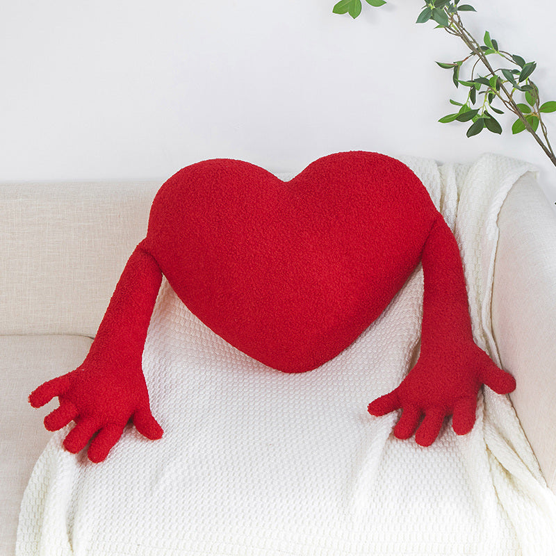 VibeCore Hug From The Heart Decorative Pillow in red, featuring a heart shape with cozy arms made from plush PP cotton. A vibrant, loving accent that brings warmth, comfort, and a playful touch to your space.