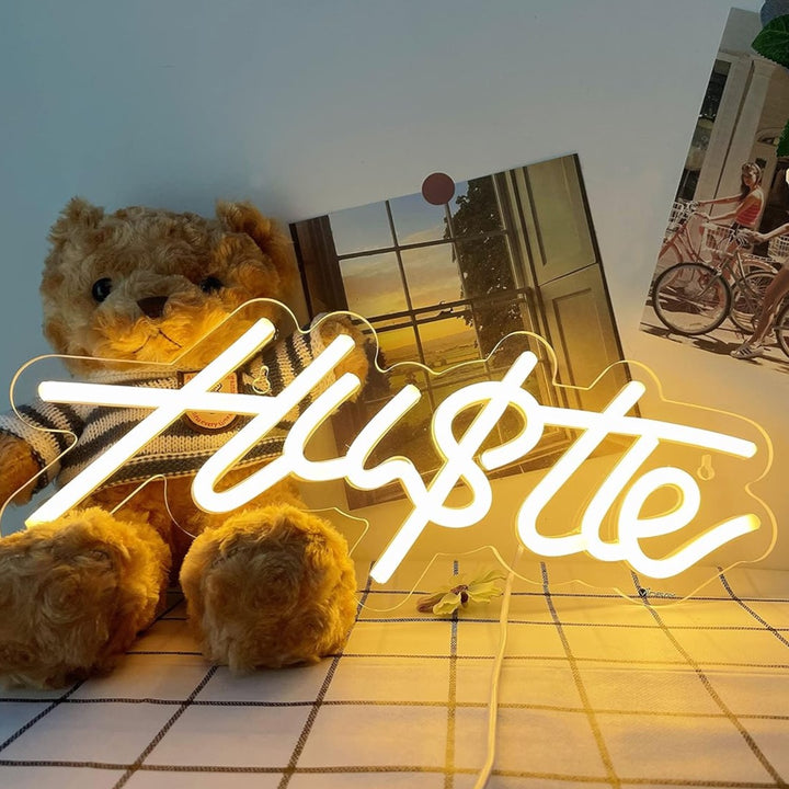 VibeCore Hustle Neon Light Leaning Against Teddy Bear