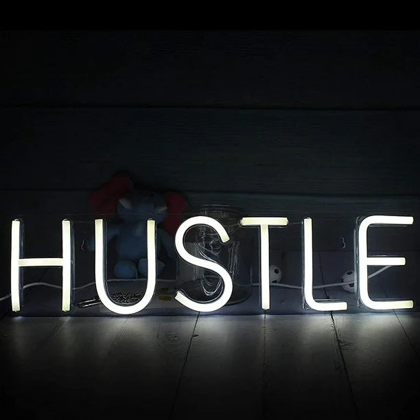 VibeCore Hustle Neon Sign On Floor