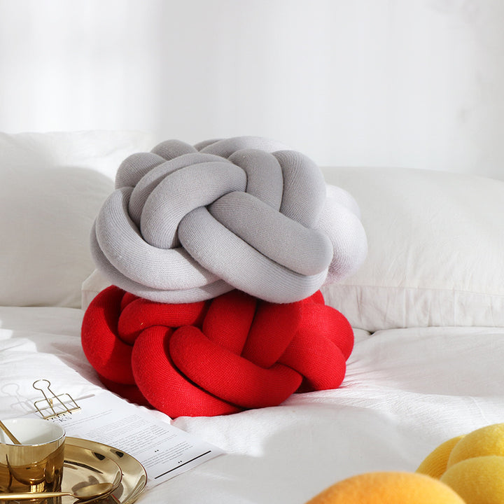 VibeCore Large Handmade Knot Throw Pillows stacked in a side view, showcasing the bold, chunky knot design in a cozy and stylish arrangement.