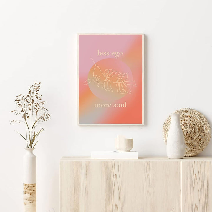 VibeCore Less Ego More Soul canvas print framed on wall, inspirational minimalist typography art for soulful bedroom, dorm, or apartment decor.