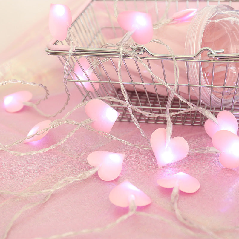 VibeCore little hearts string lights, glowing with soft white LEDs, adding a cozy, charming touch to your space with a sweet, ambient glow.