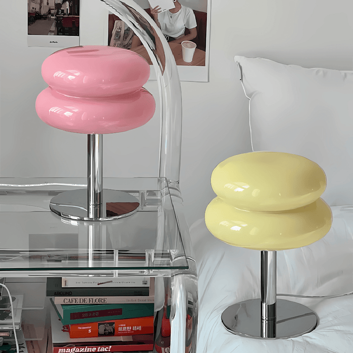 A stylish, Bauhaus-inspired set of table lamps in soft pink and cream hues. Crafted from high-quality glass and iron, these lamps bring a unique charm to your space, blending playful colors with sophisticated design. Ideal for adding a cozy and fun vibe to your room, perfect for creating an aesthetic and inviting atmosphere.
