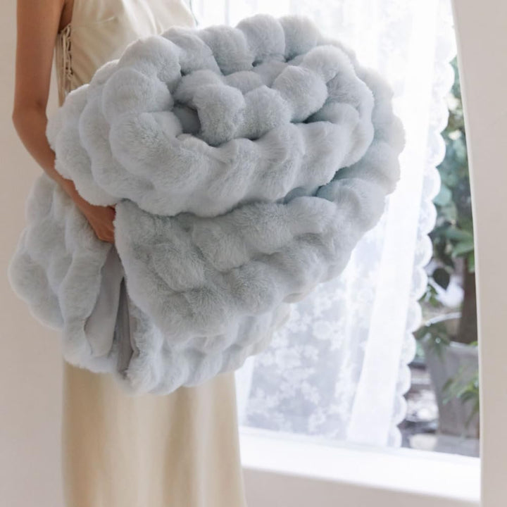 VibeCore Marshmallow Ultra Plush Blanket Pastel Blue Folded, demonstrating the thickness and quality of the blanket.