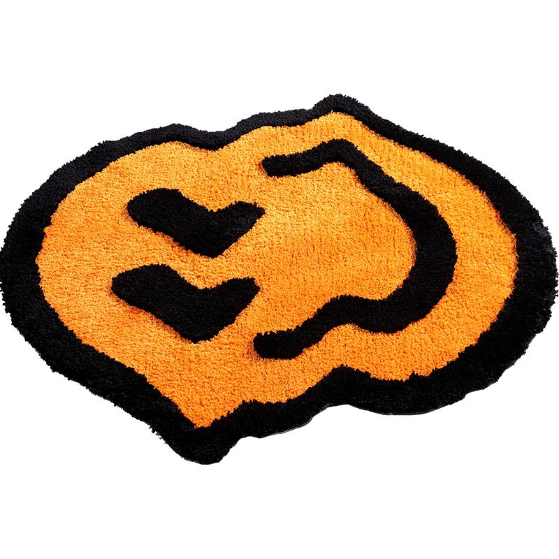 VibeCore Melting Smiley Accent Rug Orange Product View, showcasing the vibrant orange color and playful melting smiley face design, adding a fun, bold touch to any space while offering plush comfort.