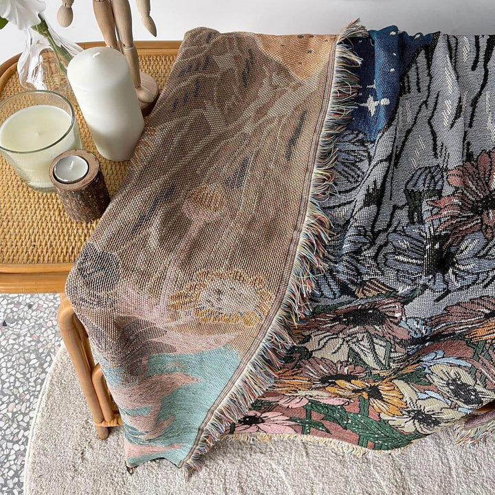 VibeCore Midnight Mountain Woven Blanket reversible design close-up, highlighting serene mountain patterns and soft 100% combed cotton texture.