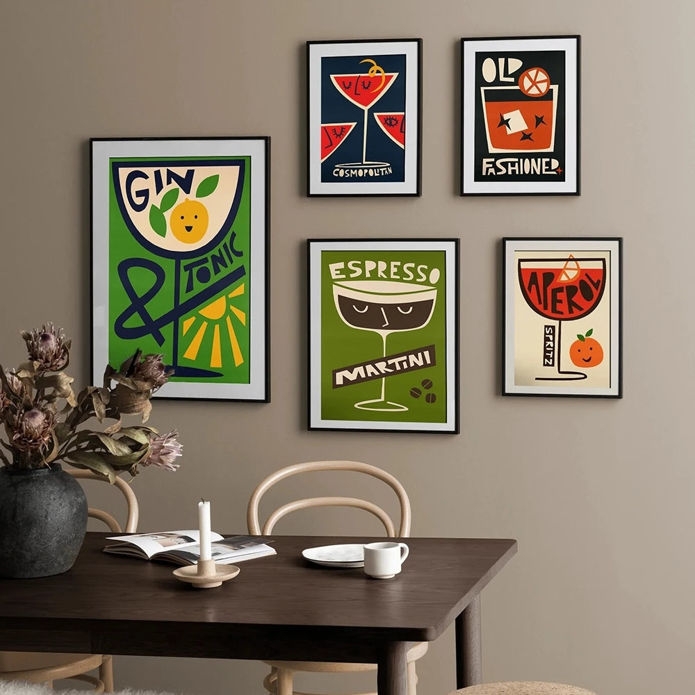 A vibrant collage of "Modern Mixology Canvas Posters" featuring pop art-inspired designs of iconic cocktails like Espresso Martini, Gin and Tonic, Aperol Spritz, and Cosmopolitan. The bold, playful colors and energetic graphics bring a lively atmosphere to any room, perfect for bar carts, bedrooms, or dorms. Ideal for mixology enthusiasts, these trendy prints add fun and personality to your decor.