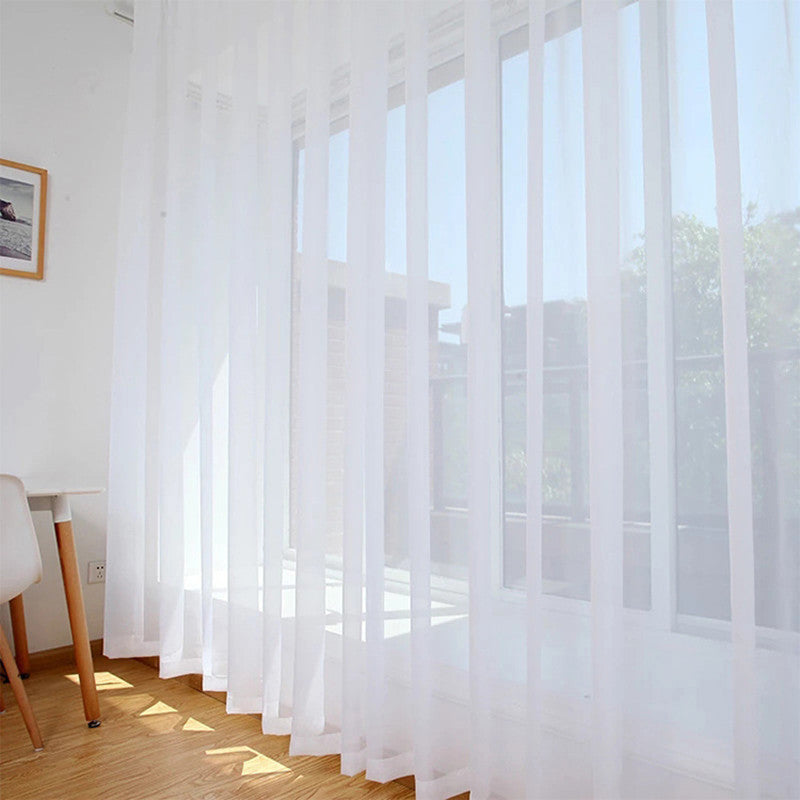 VibeCore Modern Sheer Curtain, made from textured polyester voile, perfect for filtering sunlight and maintaining privacy. Features a silver grommet design for easy hanging and a modern, airy look.