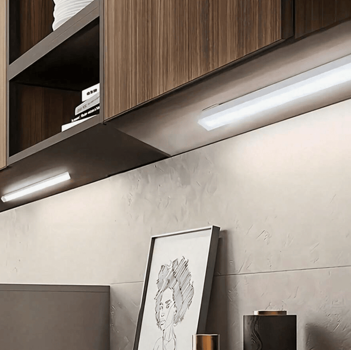 VibeCore Motion Sensor LED Light Bar installed under cabinets, providing hands-free, motion-activated lighting to brighten your kitchen or workspace. Its sleek design and easy adhesive installation make it the perfect solution for under-cabinet lighting, offering energy-efficient illumination wherever you need it.