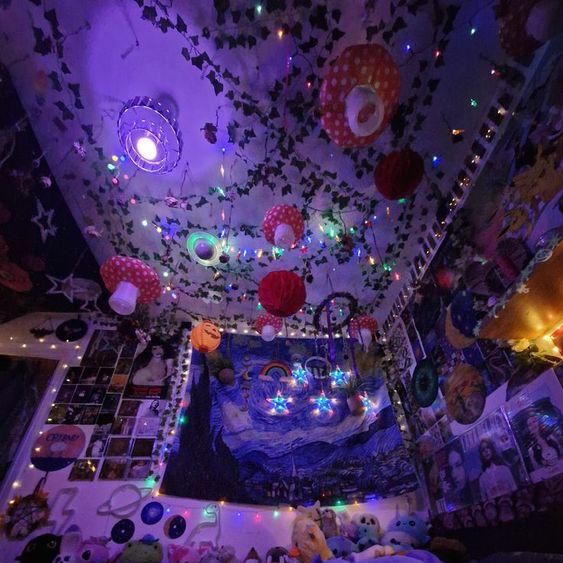 VibeCore Mushroom Lantern Pendants hanging in a cluster from the ceiling of a grunge room, adding a whimsical yet edgy touch to the dark, industrial decor.