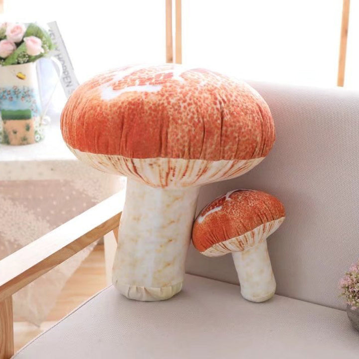 VibeCore Mushroom Throw Pillow in two sizes on a couch, featuring a fun, nature-inspired mushroom shape. Ultra-soft plush material and filled with PP cotton, these cozy pillows bring a whimsical, fairycore touch to your space.