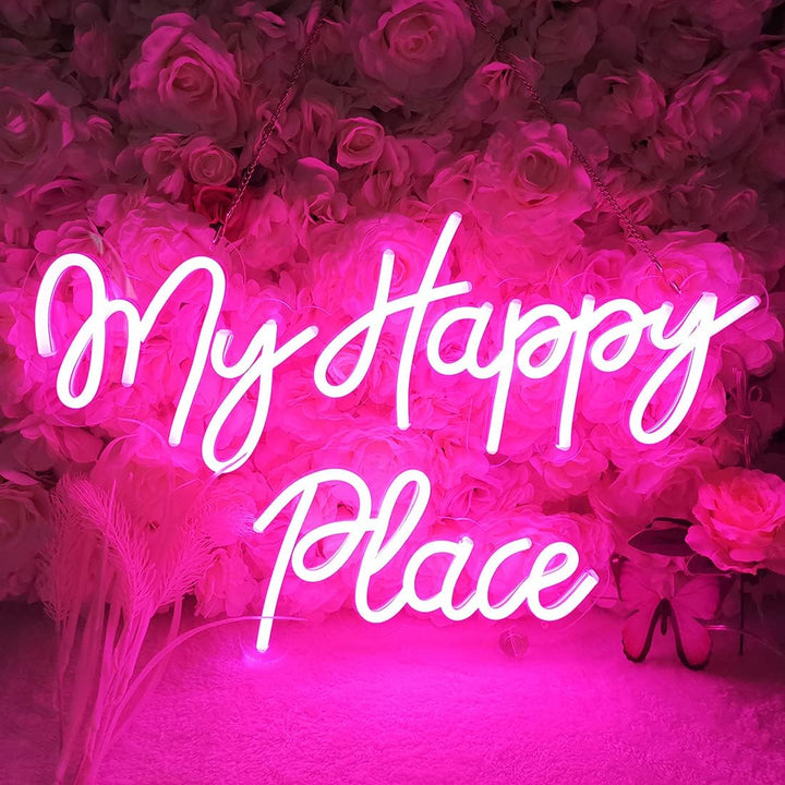 VibeCore My Happy Place Neon Light With Flowers Behind It