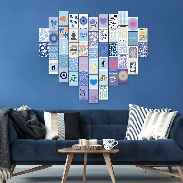 VibeCore Pastel Purple Aesthetic Wall Collage Kit displayed above a couch, featuring 70 chic pastel purple and blue prints with Matisse-inspired designs. Perfect for creating a calming, stylish vibe in your living room or lounge area.