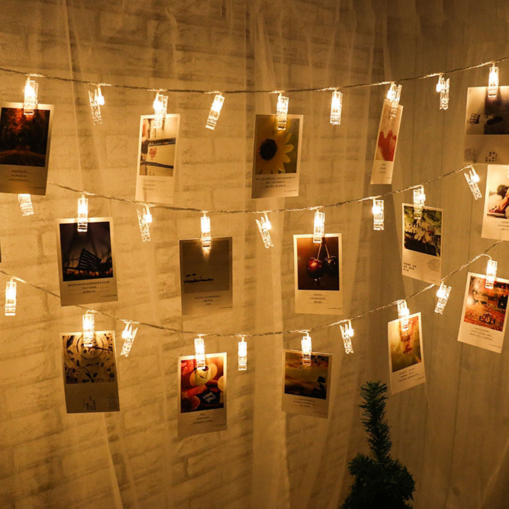VibeCore photo clip string lights with warm white or colorful LEDs, showcasing pictures with vibrant and bright lighting. Battery-powered for easy, portable use.