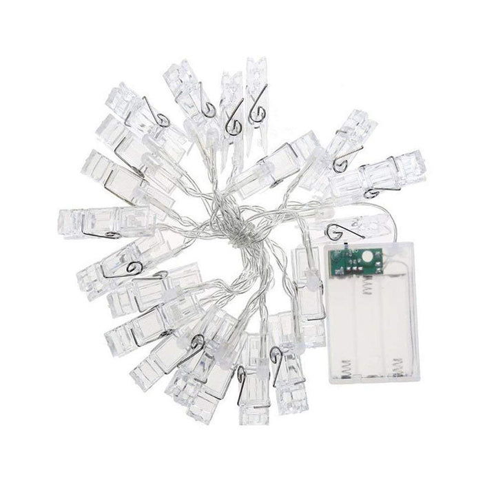 Unlit VibeCore photo clip string lights in package, ready to brighten your space and showcase your favorite memories with vibrant lighting.