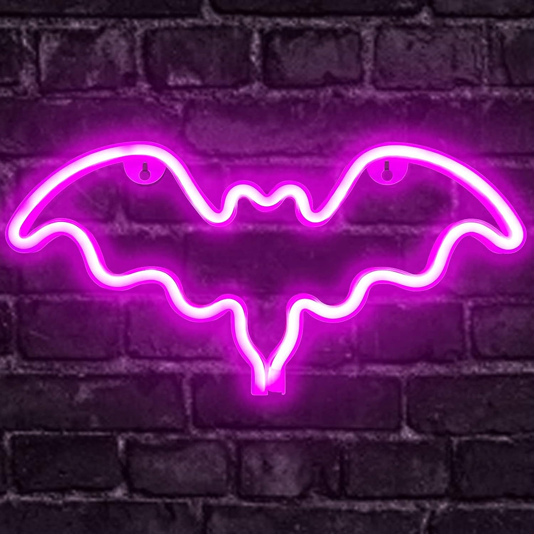 VibeCore Pink Bat Neon Light On Brick Wall