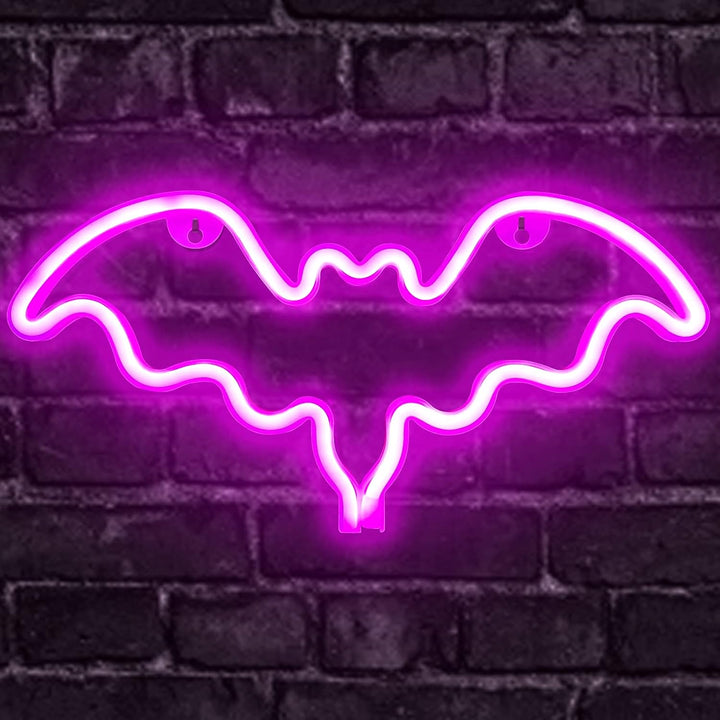 VibeCore Pink Bat Neon Light On Brick Wall
