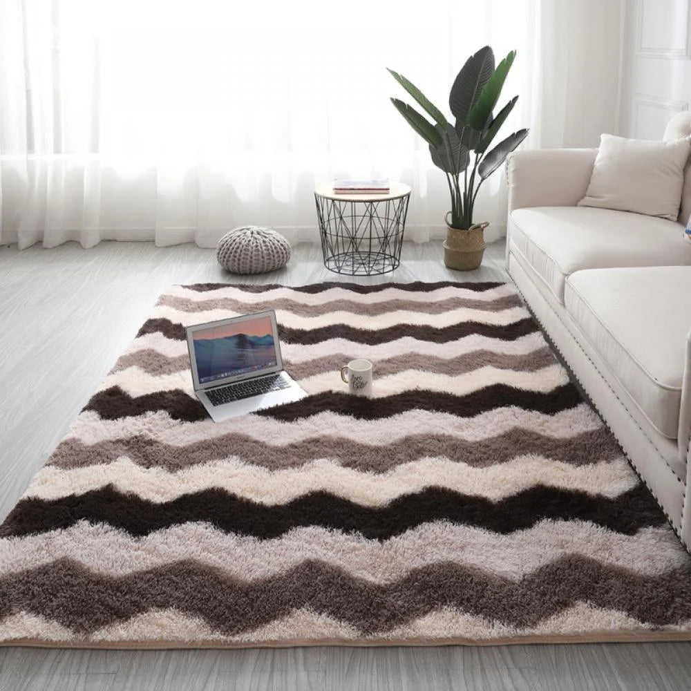 VibeCore Plush Patterned Area Rug in brown zigzag pattern, featuring a soft polyester fiber texture and non-slip backing. Adds a cozy, stylish touch to any room. Easy to clean and available in 5 stylish options.