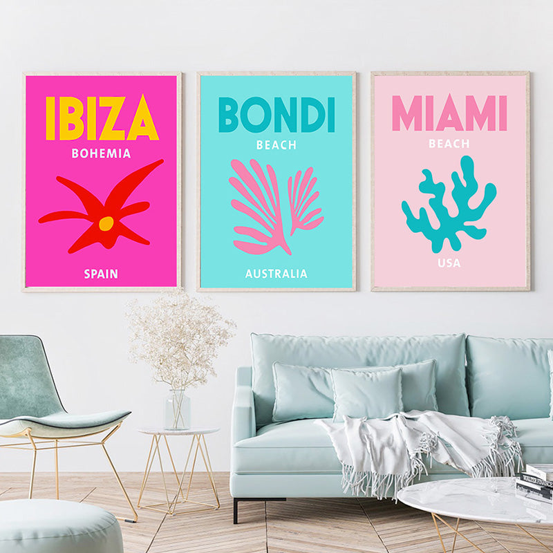 VibeCore Preppy Travel Canvas Posters displayed on a living room wall, featuring three vibrant prints of stunning destinations like Bondi Beach, Mykonos, and Santorini. These artsy travel posters add a touch of wanderlust and beachy charm, perfect for creating a preppy, adventurous vibe in your space. Printed on premium cotton canvas with a semigloss finish for lasting style and color.