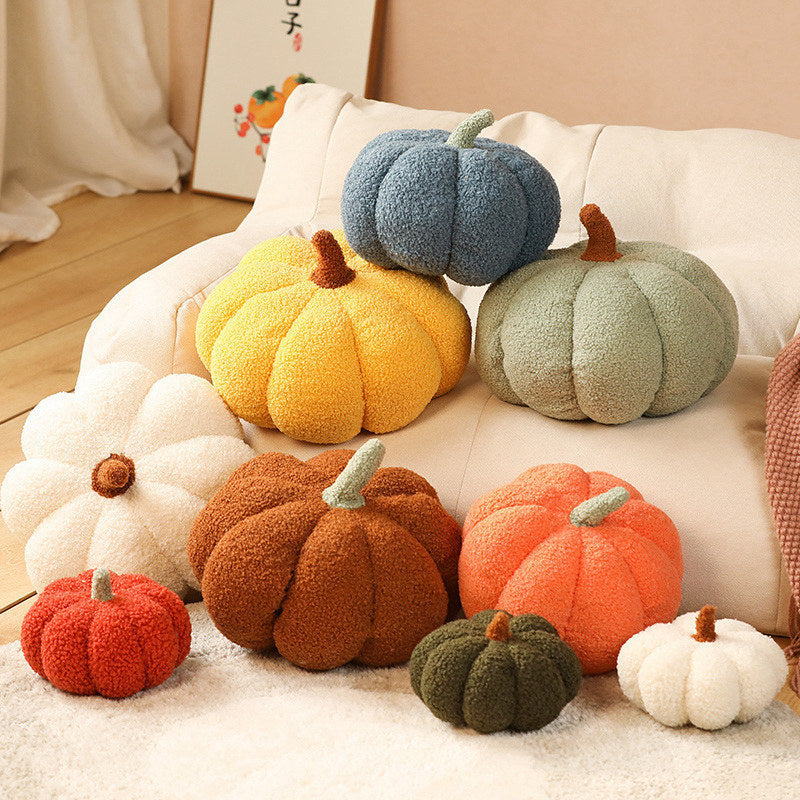 VibeCore Pumpkin Throw Pillow in all colors, featuring a cozy pumpkin-shaped design in white, blue, brown, orange, dark green, pastel green, red, yellow, and light pink. Soft teddy velvet cushion filled with PP cotton for a plush, comfortable feel. A perfect seasonal accent for adding cozy, autumn vibes to your couch, bed, or cozy nook.