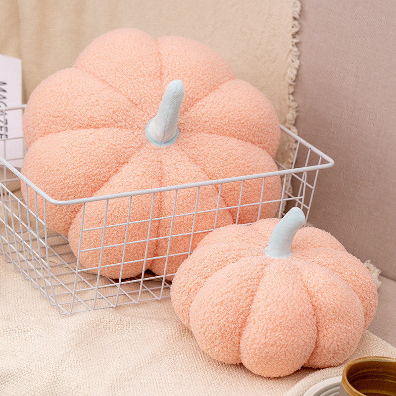 VibeCore Pumpkin Throw Pillow in light pink, featuring a cozy pumpkin-shaped design crafted from soft teddy velvet and filled with PP cotton for plush comfort. Perfect for adding a playful, autumn-inspired touch to any room.