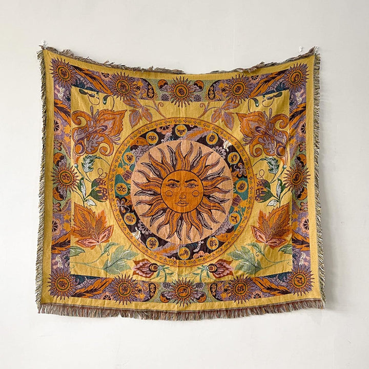 VibeCore Radiant Sun Woven Blanket product view, featuring vibrant boho-sun design and soft 100% combed cotton texture.