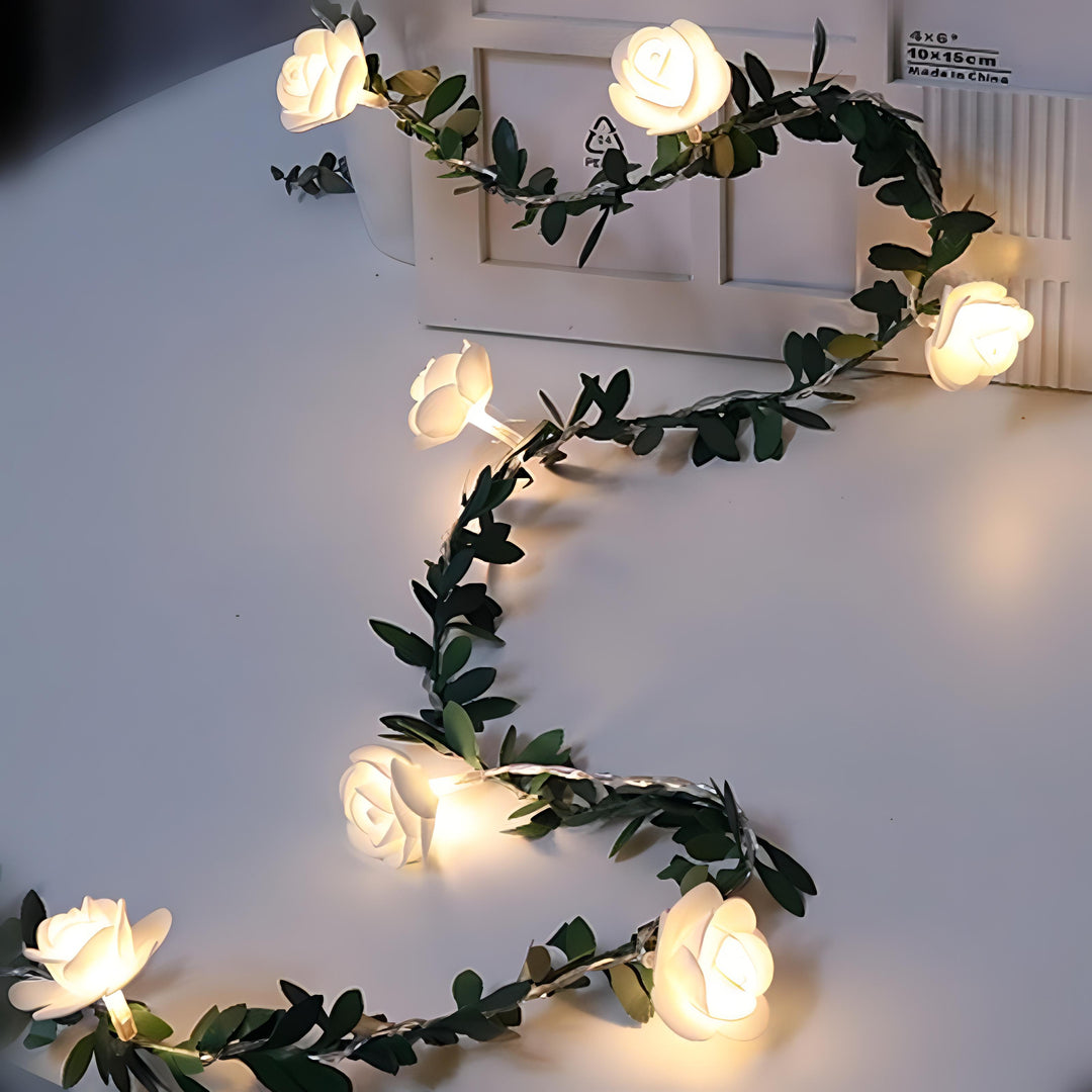 VibeCore rose flower string lights, glowing with warm white LEDs, adding a cozy and vibrant ambiance to any space, battery-operated for portability and easy setup.