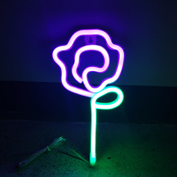 VibeCore Rose Neon Light in purple, casting a soft, romantic glow perfect for bedrooms, dorms, or lounges.