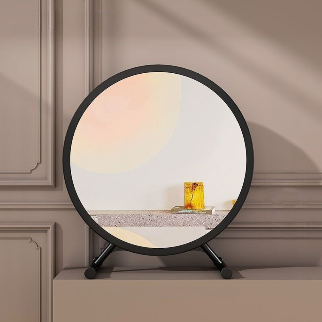 VibeCore Round Vanity Mirror product view, sleek minimalist design, high-resolution reflection, available in black and white, perfect for modern decor and beauty routines.