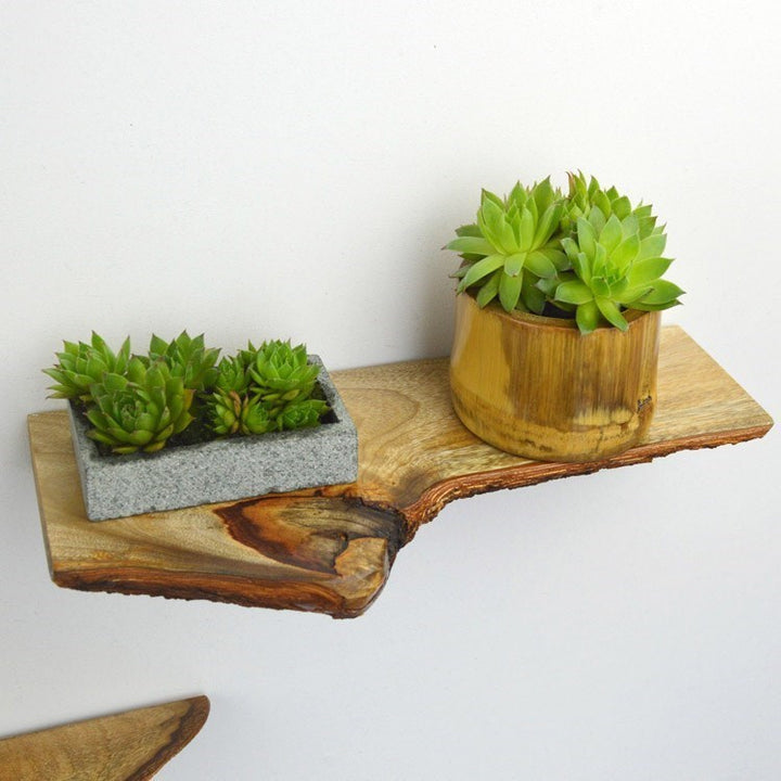 VibeCore Rustic Solid Wood Floating Wall Shelf aerial close-up, showcasing the detailed wood grain and sleek, natural design.
