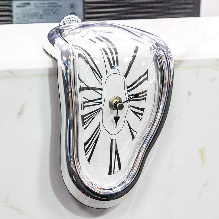 VibeCore Salvador Dali's Melting Clock in Silver, captured in a close-up, showcasing its surreal, melting design and sleek metallic finish.