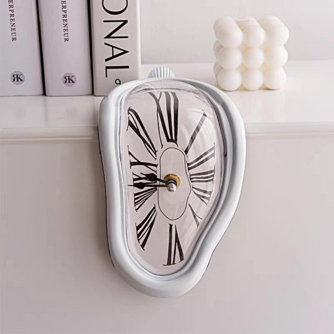 VibeCore Salvador Dali's Melting Clock in White, featuring a surreal, draped design that combines artistic flair with functional timekeeping, adding a unique touch to your decor.