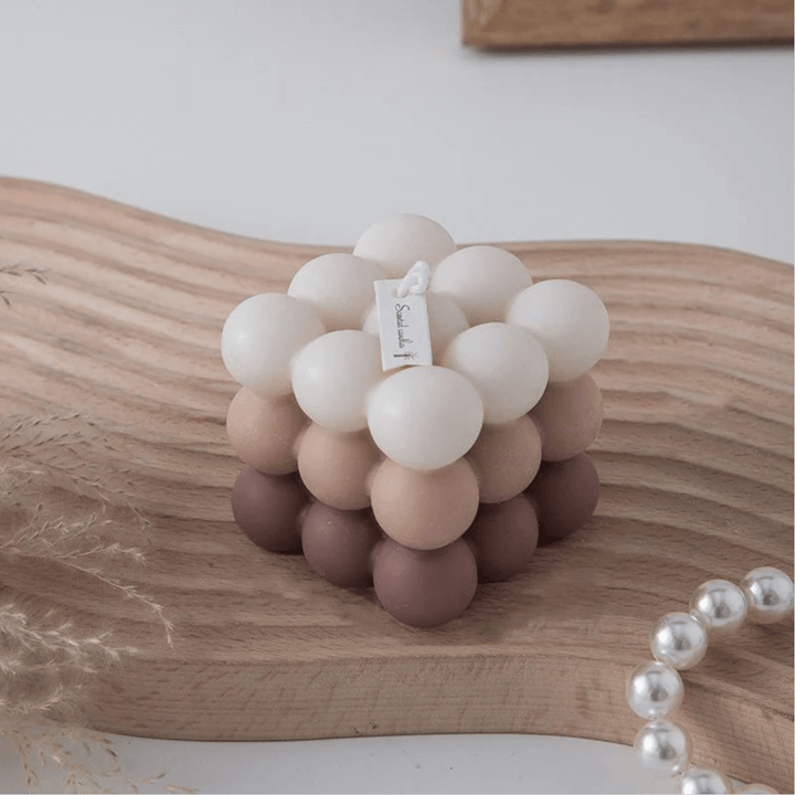 Scented Gradient Bubble Cube Candle in brown with a modern cube design and gradient effect.