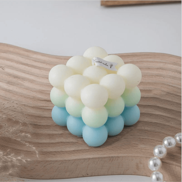 Scented Gradient Bubble Cube Candle Sky Blue with modern cube design and soothing fragrance.