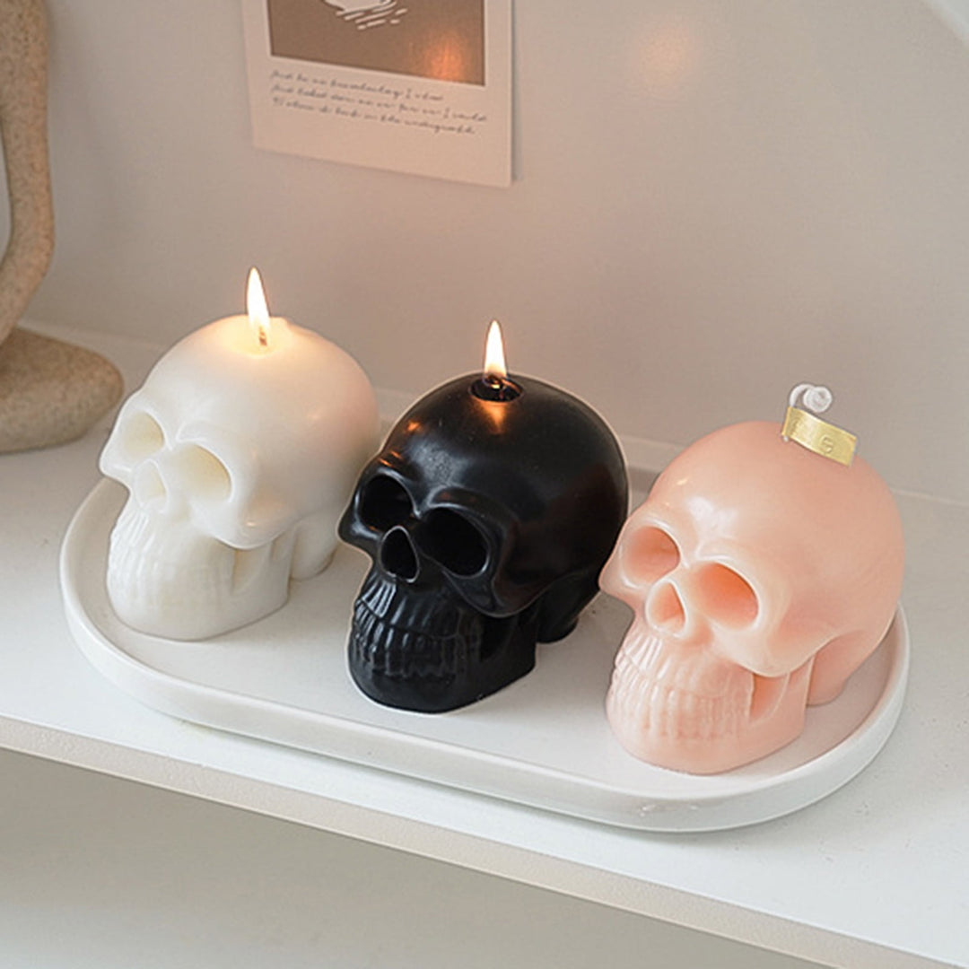 Rose, white, and black scented skull candles, featuring bold, striking designs and captivating fragrances, perfect for adding an edgy and unique touch to your room decor.