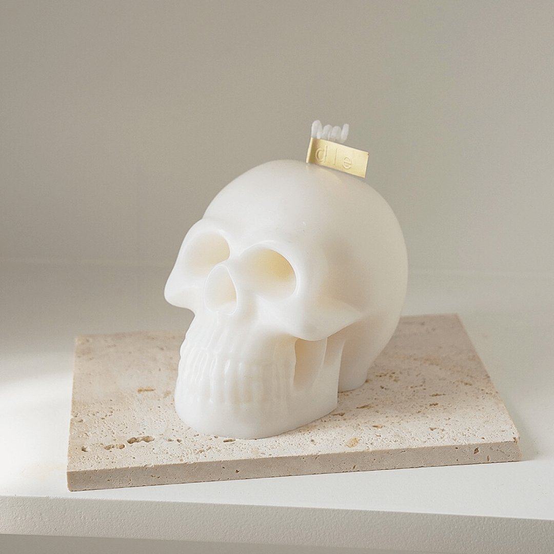 White scented skull candle, featuring a bold, striking design and captivating fragrance, perfect for adding an edgy, daring touch to your room decor.
