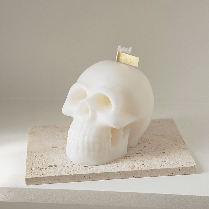 White scented skull candle, featuring a bold, striking design and captivating fragrance, perfect for adding an edgy, daring touch to your room decor.