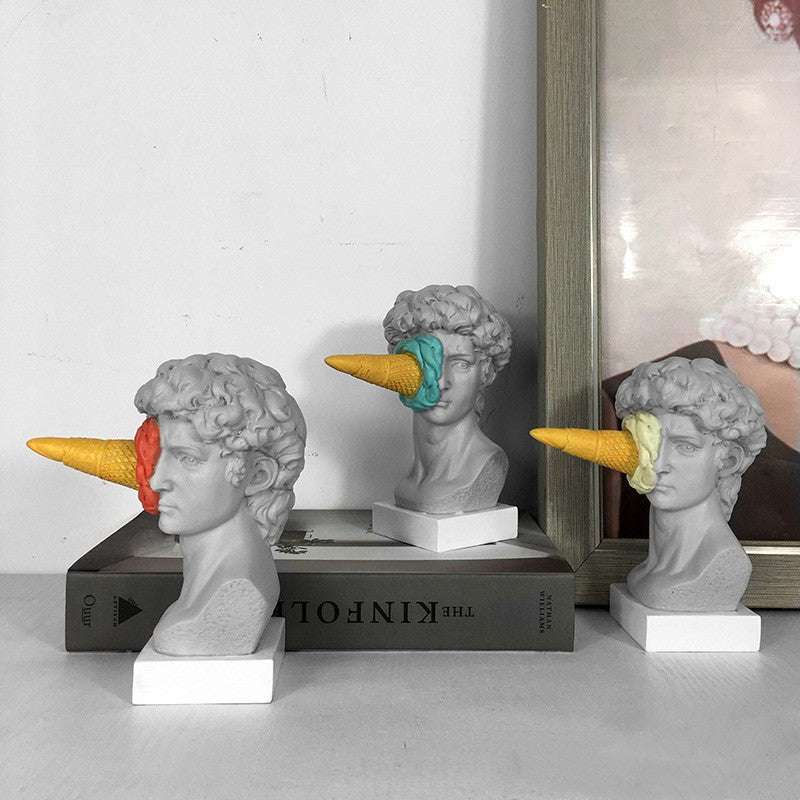 All three colors of the Smashed Ice Cream David sculpture in blue, red, and yellow, featuring a playful minimalist design with vibrant colors, perfect for adding a fun and unique touch to your room decor.