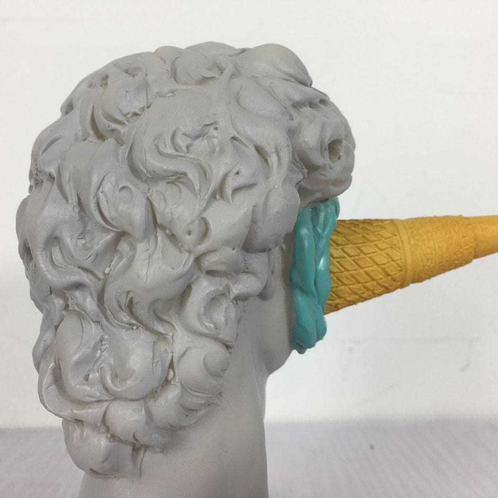 Close-up side view of the blue Smashed Ice Cream David sculpture, showcasing its playful minimalist design and vibrant colors, perfect for adding a fun and unique touch to your room decor.