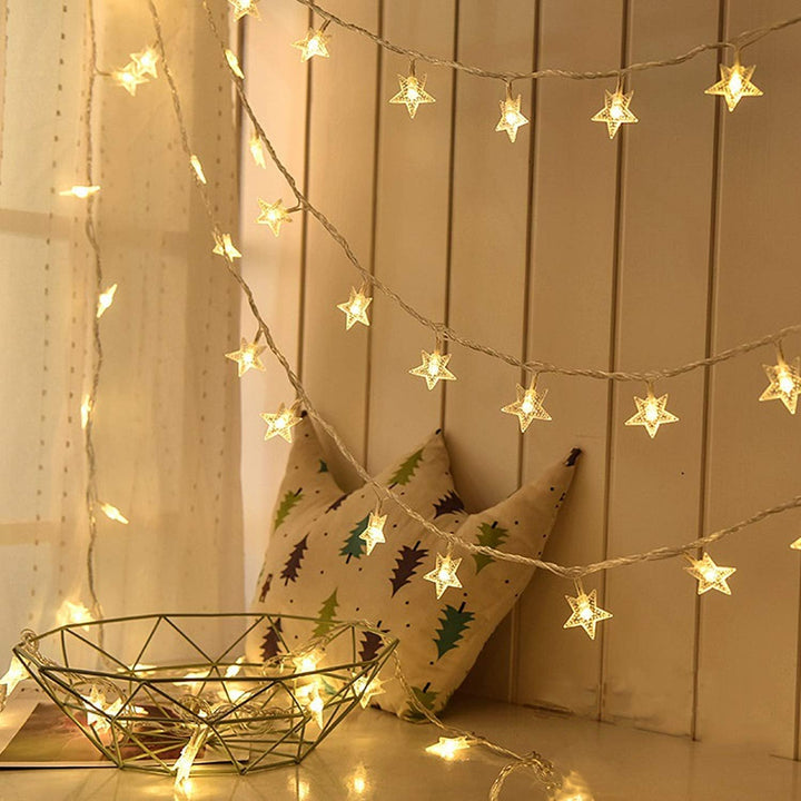 VibeCore stars string lights glowing with warm white LEDs, creating a magical, starry atmosphere and adding a cozy, charming touch to any space.